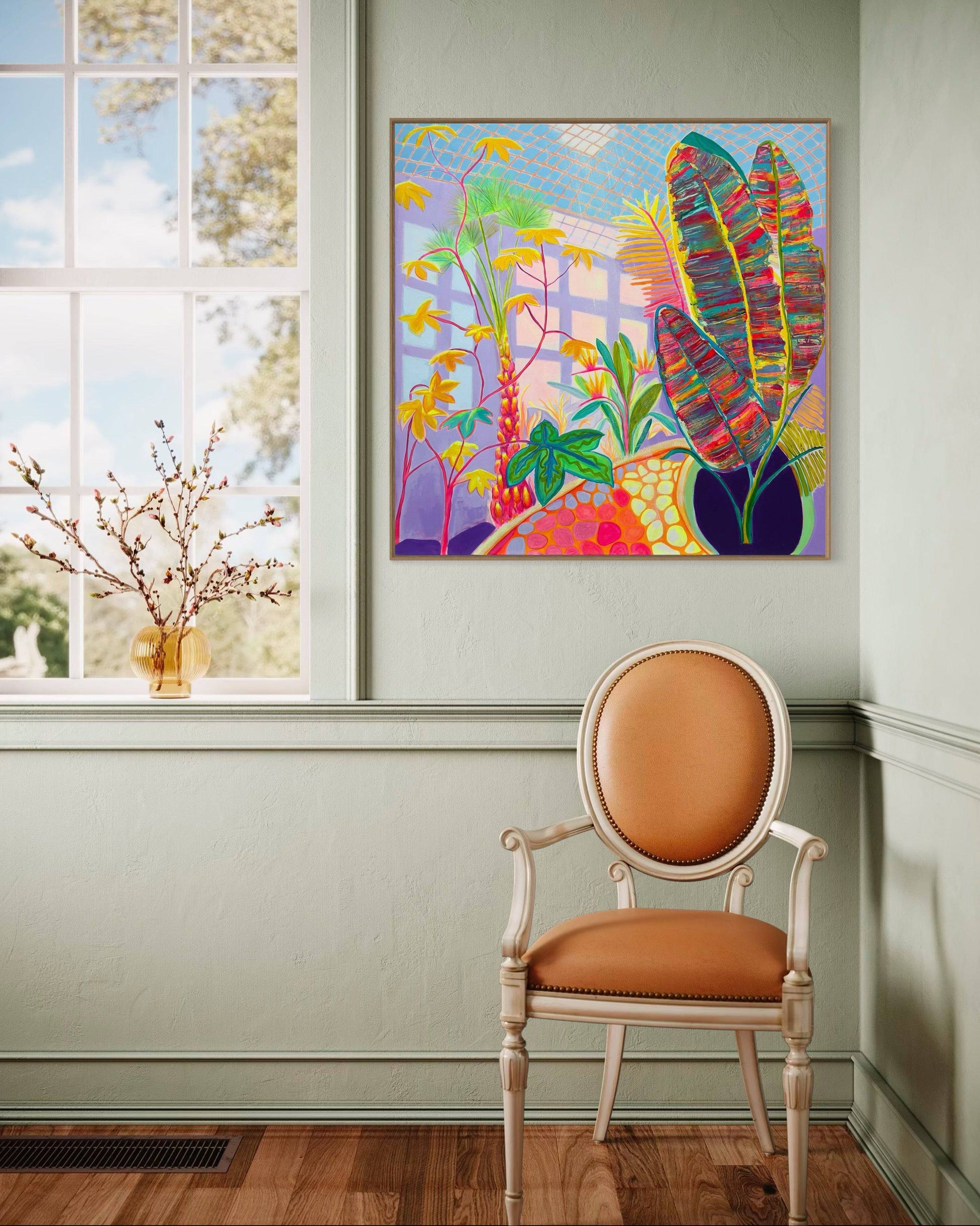 Interior with vintage leather armchair and vibrant abstract botanical painting by Kathryn Sillince on muted green wall