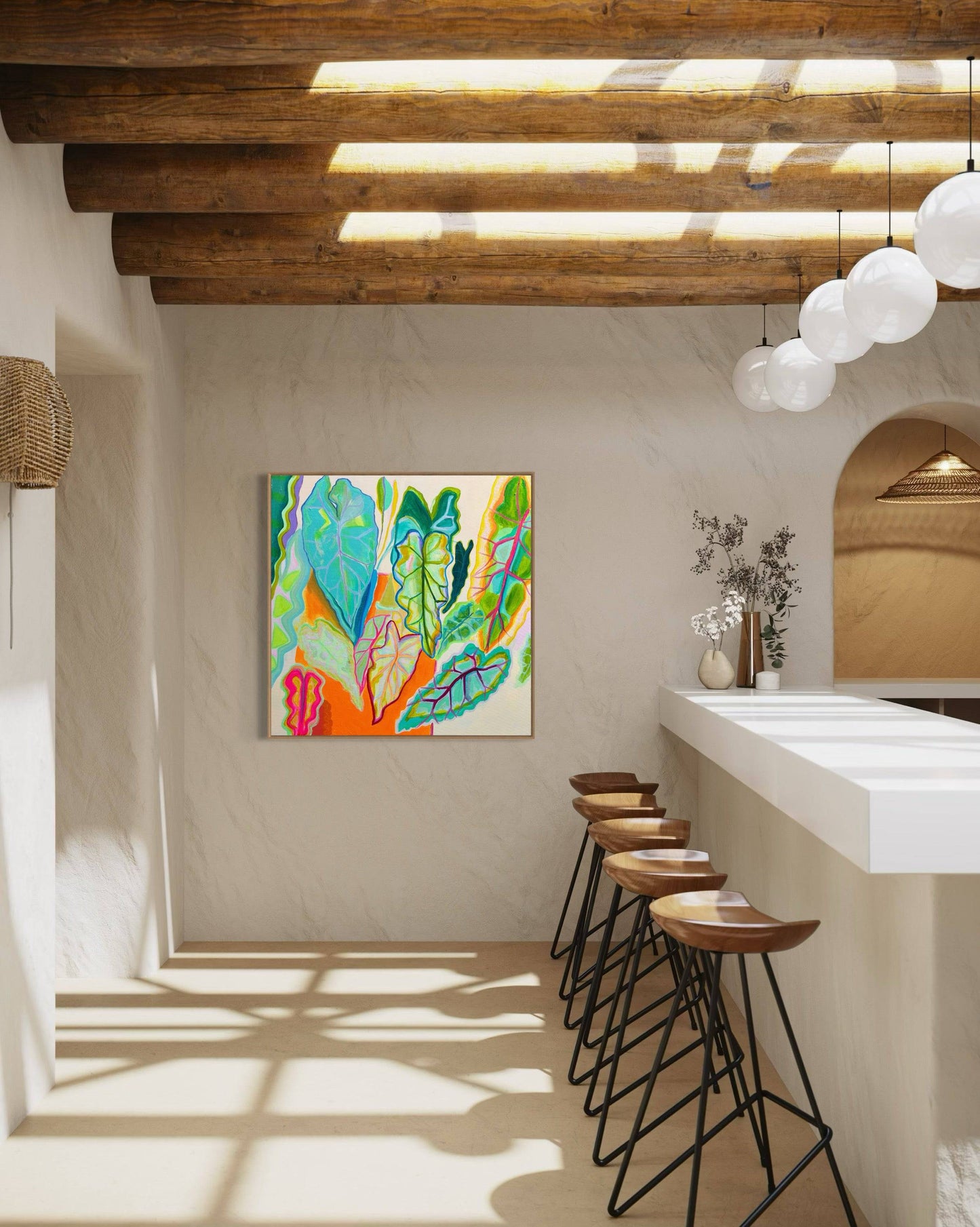Modern bright kitchen with wooden beam ceiling, bar stools, and colorful botanical abstract painting by Kathryn Sillince