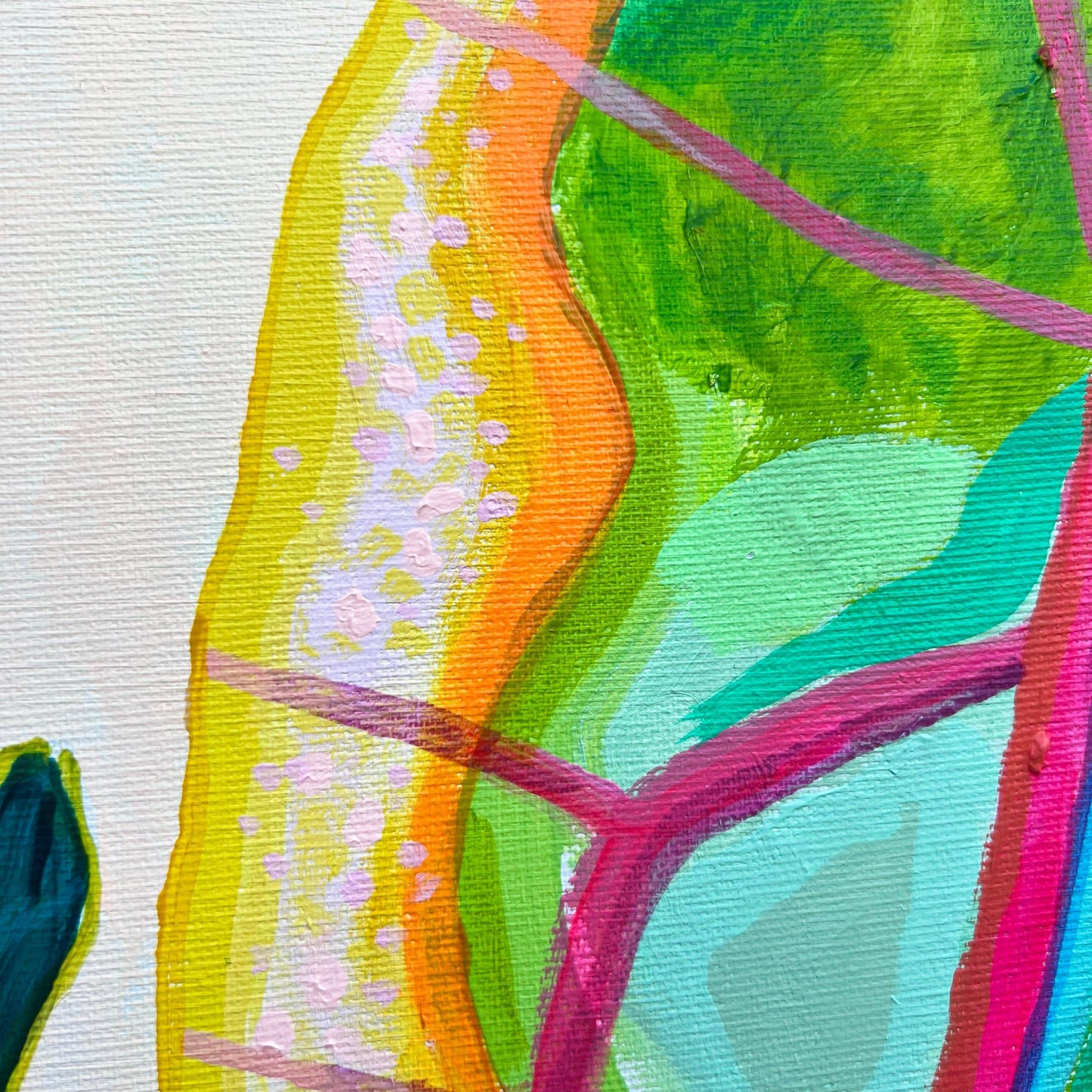 Close-up of colorful abstract botanical painting with green, yellow, orange, pink, and purple brushstrokes on canvas