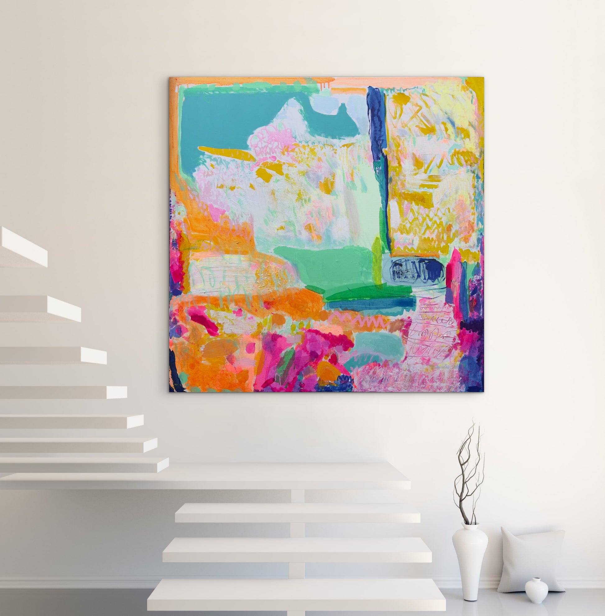 Colorful abstract painting on a white wall with minimal decor