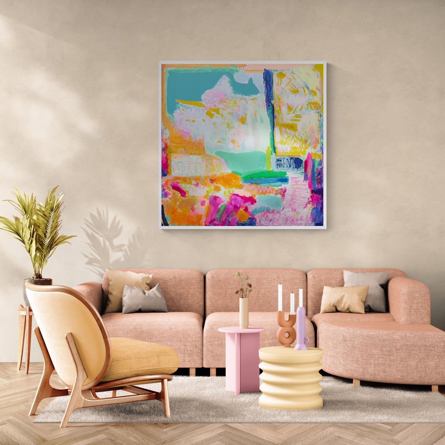 Living room with a colorful abstract painting on the wall, pink sofa, and wooden armchair.