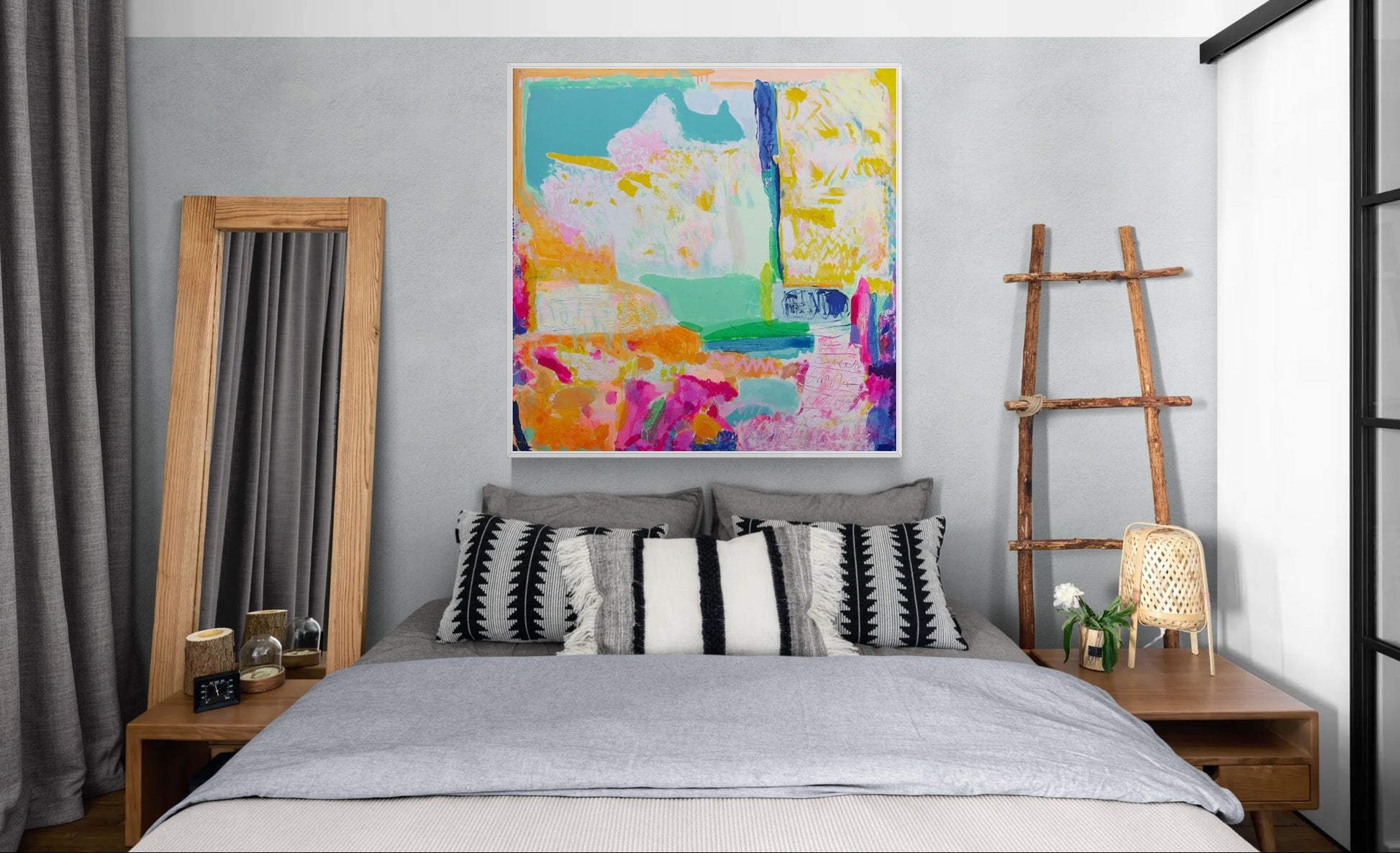Bedroom with a colorful abstract painting on the wall, wooden ladder, and decorative pillows.