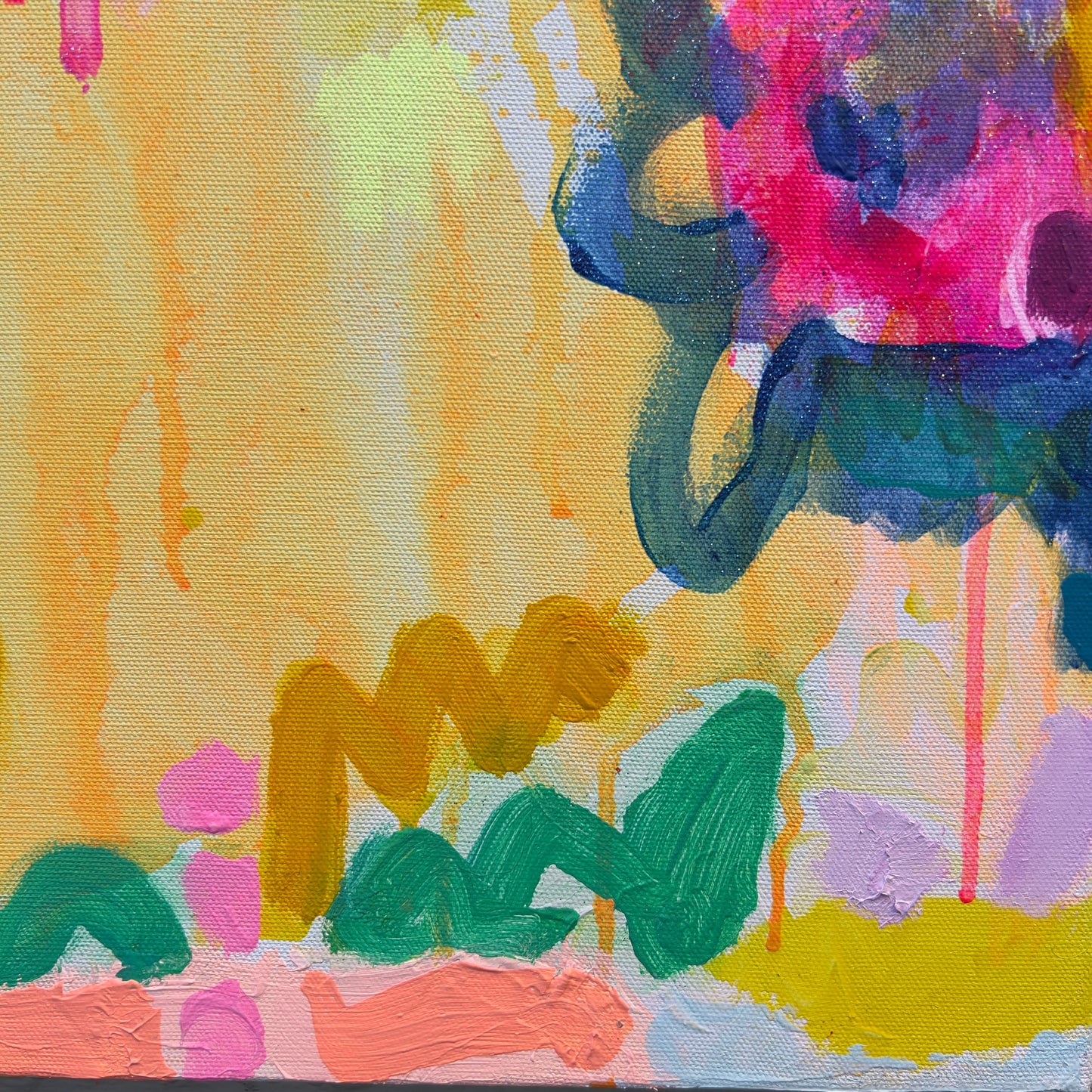 Abstract painting with colorful splashes on a textured surface