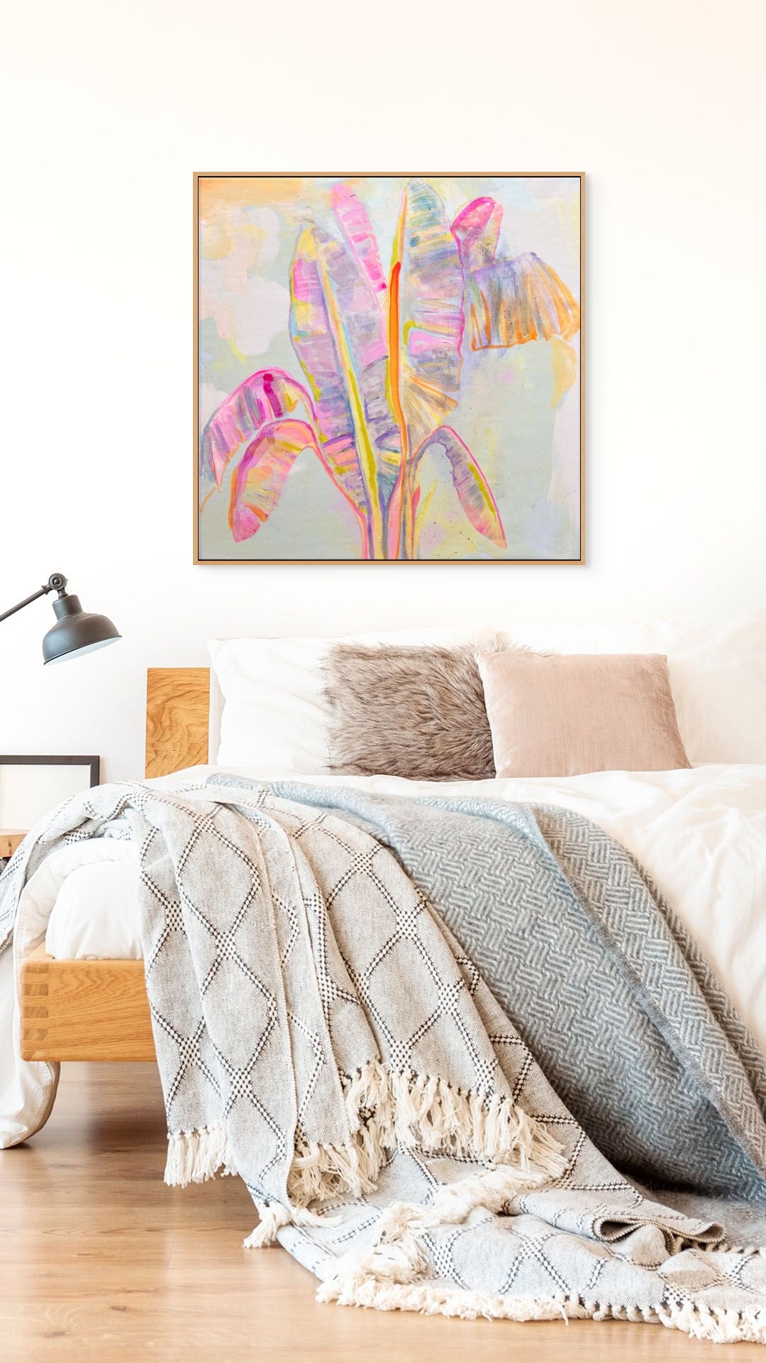Colorful Peachy Banana Dreams canvas print by Printumo featuring a vibrant, artistic banana design on textured canvas.